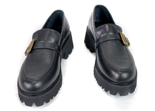 Premium black leather women's shoes with chunky outsole.